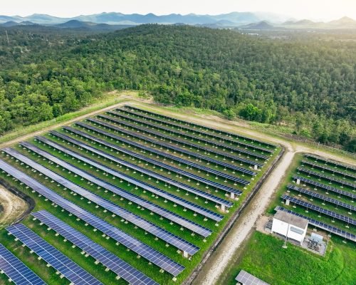 Landscape of solar farm. Solar power for green energy. Sustainab Landscape of solar farm. Solar power for green energy. Sustainable renewable energy. Photovoltaic power station or solar park. Solar panel installation and maintenance concept. Energy sustainability.